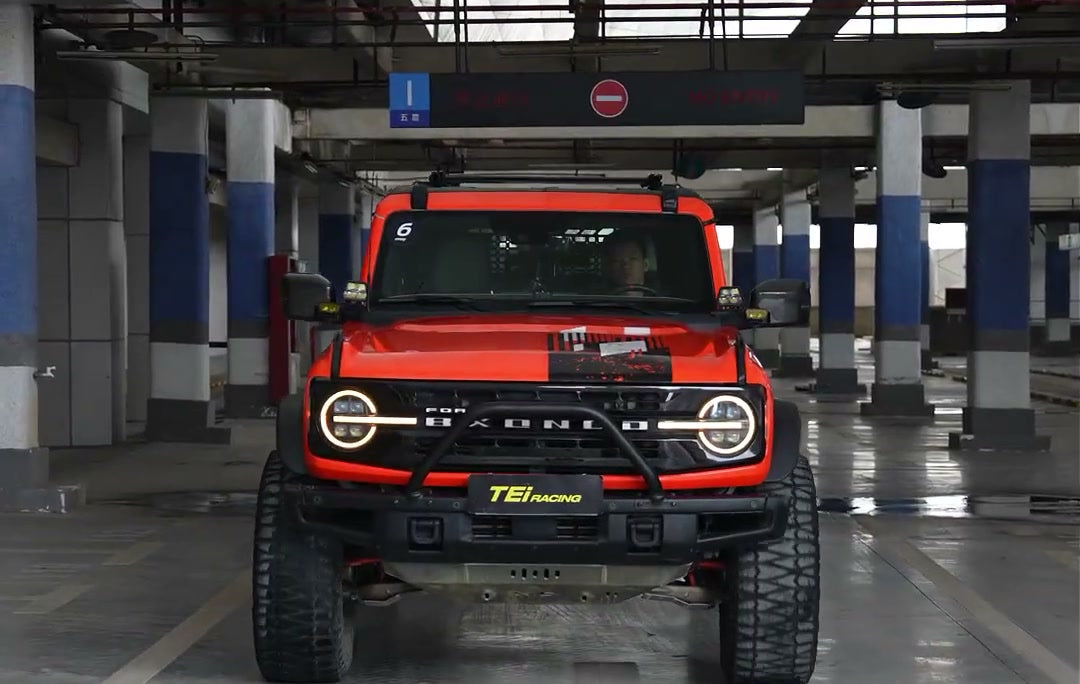 Red Ford Bronco with TEi Racing spare wheel plate after the T683 front brake upgrade